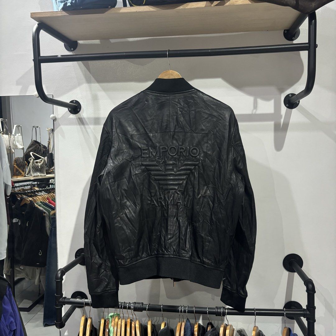 Emporio Armani Leather Bomber Jacket Embosed Design (Category: Coats, Jackets and Outerwear) located in Bambang. Submitted by heats777 (Listing ID 1465829434, Image 3). Description: Excellent condition No issue Size: 01 on tag.