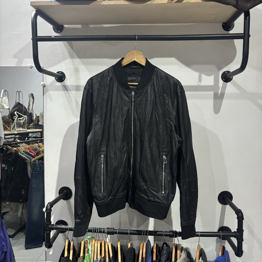 Emporio Armani Leather Bomber Jacket Embosed Design (Category: Coats, Jackets and Outerwear) located in Bambang. Submitted by heats777 (Listing ID 1465829434, Image 2). Description: Excellent condition No issue Size: 01 on tag.