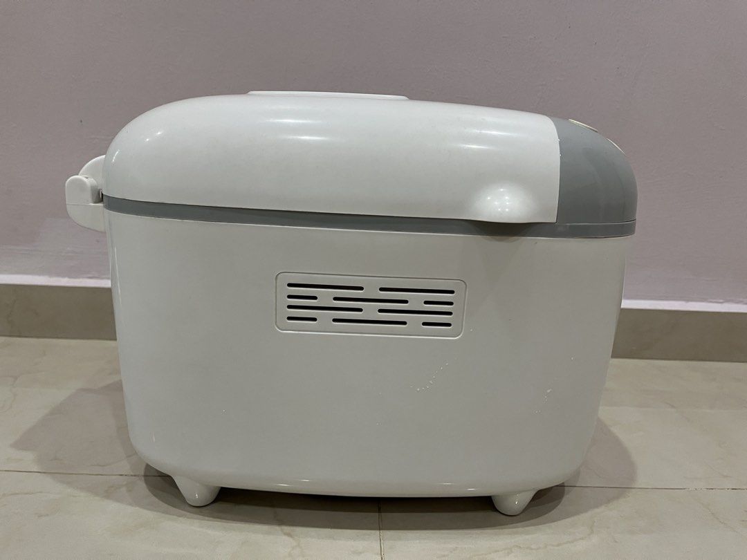 Empress Automatic Bread Maker Machine (Category: Breadmakers) located in Kuala Lumpur. Submitted by brightphoenix_e24909 (Listing ID 1465900867, Image 1). Description: - Empress automatic bread maker with a sleek grey top control panel - Multiple digital settings including basic, french, cake, quick, and jam - Generous capacity with size options up to 3.0 LB - Non-stick inner baking pan equipped with a dual paddle system and metal handle - Built-