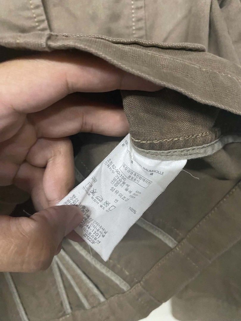 Esprit Brown Cotton Utility Jacket (Category: Coats, Jackets and Outerwear) located in Pasig City. Submitted by jstnisidor81288 (Listing ID 1465761145, Image 3). Description: - Brand: Esprit - Color: Brown - Material: 100% Cotton - Size: Tagged XS - Design: Mandarin collar with front button closure and structured paneled construction - Pockets: Two chest pockets and two lower flap pockets - Details: Embroidered Esprit logo on the left sleeve - Co
