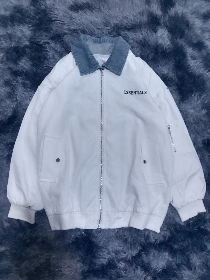 Essentials bomber jacket (Category: Coats, Jackets and Outerwear) located in Bacolod City. Submitted by wepthriftstyle (Listing ID 1465815362, Image 1). Description: Essentials bomber jacket Size/Dimes: Large to xlarge 23 width 27 length Actual color: white Color rate: 10/10 Issue:minimal black stains Overall EXCELLENT Double lining Lightweight breathable Denim collar No tags Off Payment via Gcash Delivery via j&t Nationwide shipping Unli videoca