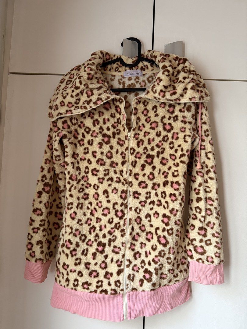 etienne Leopard Print Fluffy Zip-Up Jacket Size M (Category: Coats, Jackets and Outerwear) located in Cainta. Submitted by jerichoesguerra (Listing ID 1465921248, Image 1). Description: - Brand: Etienne - Size: Medium - Design: Beige base with brown and pink leopard spots - Features: Big floppy collar with adjustable drawstring, pink ribbed cuffs and bottom hem, full front zipper closure - Material: Soft and fuzzy - Condition: Excellent, ready to