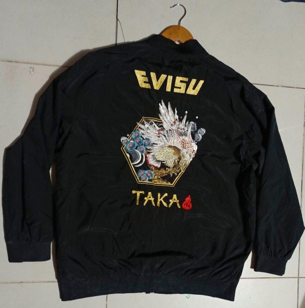Evisu bomber jacket (Category: Coats, Jackets and Outerwear) located in General Santos City (Dadiangas). Submitted by wreps (Listing ID 1465765218, Image 1). Description: 🔥 FOR SALE 🔥 Evisu bomber jacket (OFF) ✔ Size: 2XL (W-25½,, L-28) ✔ Condition: Like New ✔ Iconic Evisu embroided logo and falcon(taka) at the back 💰 Price: ₱ 800+ Sf 📍 Location: GENERAL SANTOS CITY 🚚 Shipping: J&T / meet-up 📸 Actual photos posted – what you see is what you