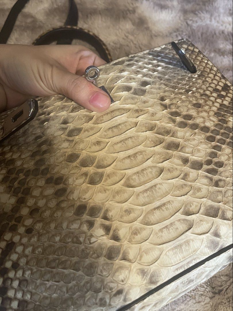 Exotic Kelly Python snake skin leather (Category: Luxury Bags & Wallets) located in Roxas City. Submitted by lynngreyartillero (Listing ID 1465802480, Image 2). Description: Genuine Leather Python Snak skin🔥🔥🔥 Kelly design rare 🔥🔥🔥 Apaka gandaaaa!!! Undeclared ko sling since yung kanyang hook is sira so pwd nmn sya as handbag isama ko nlng din kasi sling nya tlga yan 🤍🤍🤍 Free sf 🔥🔥🔥 Apakaganda nito small semi med size 🔥🔥🔥 No flaws 