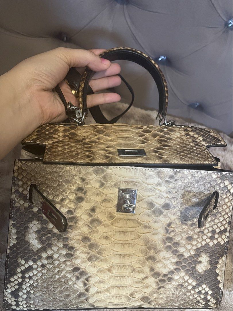 Exotic Kelly Python snake skin leather (Category: Luxury Bags & Wallets) located in Roxas City. Submitted by lynngreyartillero (Listing ID 1465802480, Image 3). Description: Genuine Leather Python Snak skin🔥🔥🔥 Kelly design rare 🔥🔥🔥 Apaka gandaaaa!!! Undeclared ko sling since yung kanyang hook is sira so pwd nmn sya as handbag isama ko nlng din kasi sling nya tlga yan 🤍🤍🤍 Free sf 🔥🔥🔥 Apakaganda nito small semi med size 🔥🔥🔥 No flaws 