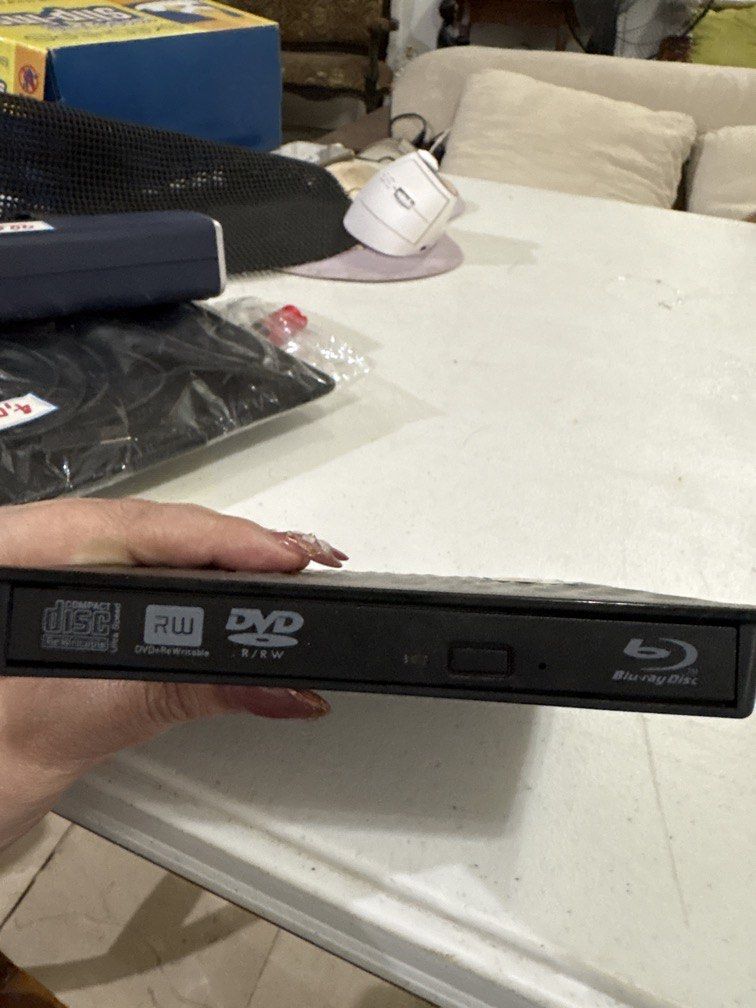 External DVD reader and writer (Category: Hard Disks & Thumbdrives) located in Paranaque City. Submitted by shopofashopaholic (Listing ID 1465842998, Image 3). Description: External DVD reader and writer Almost unused, but lost bix.