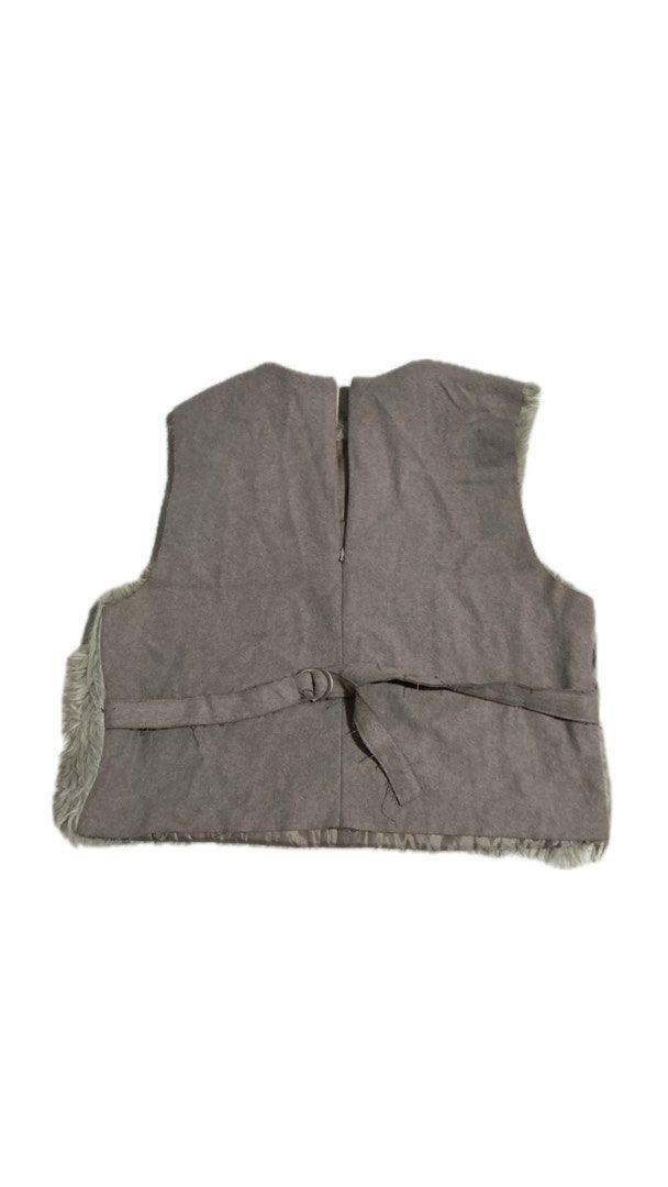 Faux Fur Grey Vest With Back Buckle Strap (Category: Sleeveless) located in La Trinidad. Submitted by ezraaaa29 (Listing ID 1465861000, Image 3). Description: - Color: Grey Size: small to medium - Material: Soft fluffy faux fur front with a suede-like back - Design: Open front, sleeveless layering piece - Details: Adjustable waist strap with metal ring closure - Condition: Great pre-loved condition - Perfect for: Cold weather OOTDs and stylish la