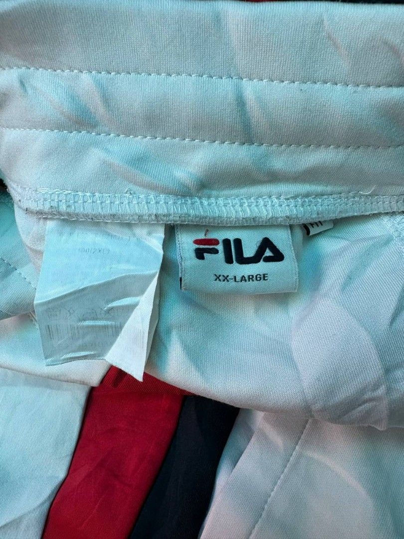 FILA TRICOLOR SIDE-STRIPE SWEAT SHORTS (Category: Shorts) located in Tacurong. Submitted by ukayutopia (Listing ID 1465874544, Image 3). Description: Waist(Flat Laid): 17.5 inches(stretchable) Length: 21.5 inches.