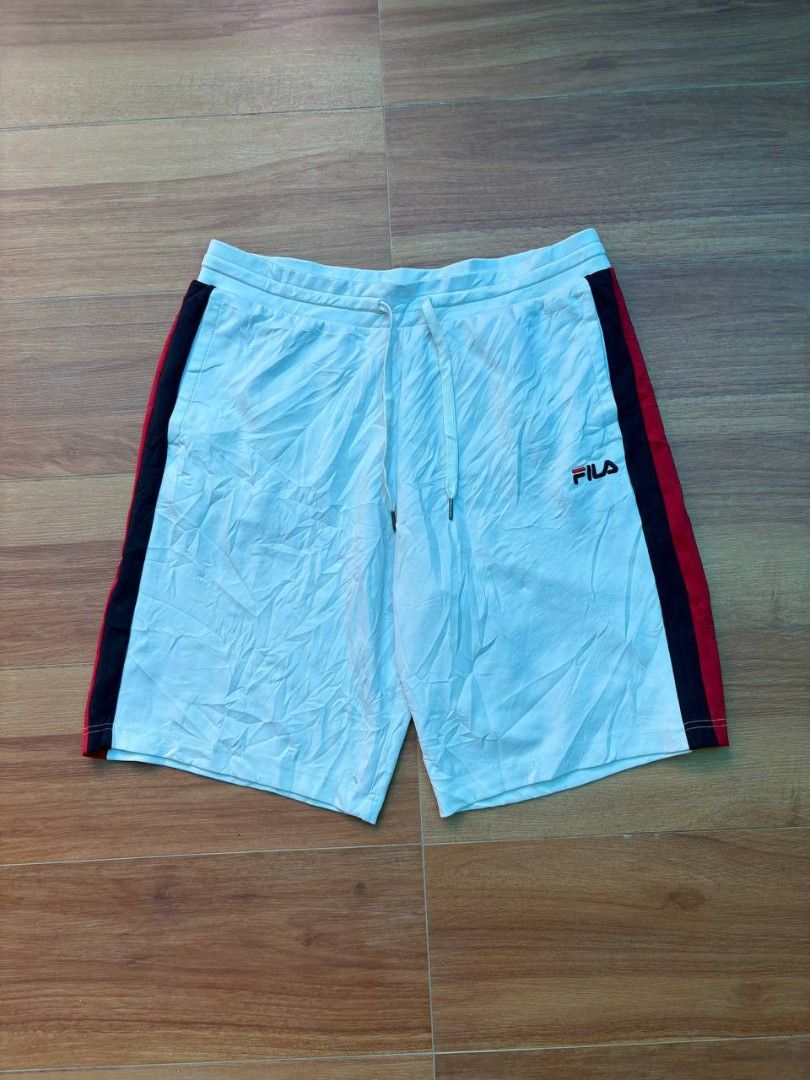FILA TRICOLOR SIDE-STRIPE SWEAT SHORTS (Category: Shorts) located in Tacurong. Submitted by ukayutopia (Listing ID 1465874544, Image 1). Description: Waist(Flat Laid): 17.5 inches(stretchable) Length: 21.5 inches.
