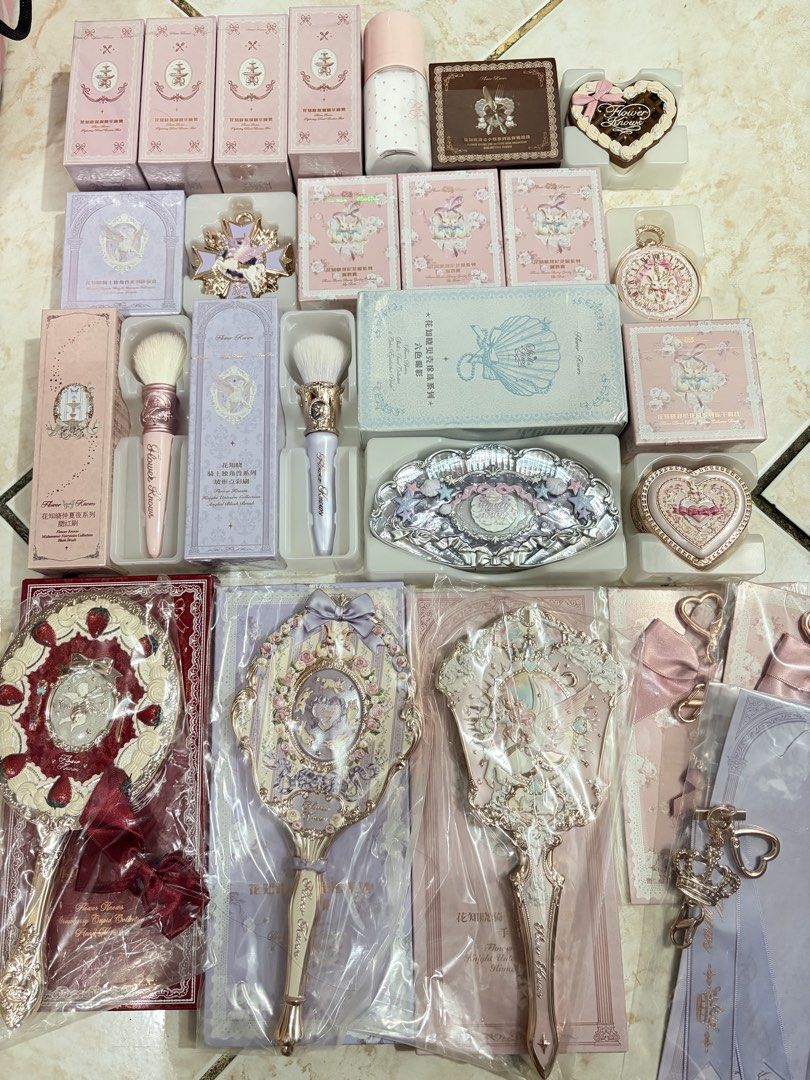 Flower Knows Makeup (Category: Makeup) located in Caloocan City. Submitted by Mariane_ (Listing ID 1465895371, Image 2). Description: - Massive Flower Knows makeup haul - Includes eyeshadow palettes, setting powder, brushes, and hand mirrors - Features popular collections: Strawberry Cupid, Unicorn, Swan Ballet, and Chocolate Bear - All items come in original boxes - Perfect for a complete aesthetic vanity upgrade.