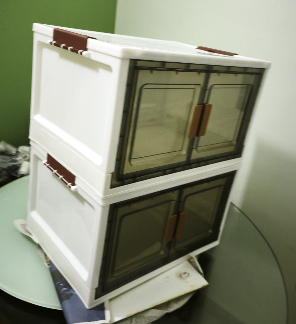 Foldable Storage Cabinet — Stackable, Space-Saving (Category: Other Home Furniture) located in Kuala Lumpur. Submitted by homegoodsm91290 (Listing ID 1465819494, Image 2). Description: Practical & neat storage solution — easy to assemble, fold away when not in use! Details: - 2 cabinets — can stack or use separately - Translucent doors → see contents without opening - Smooth handles, sturdy frame, easy click assembly - Saves space: folds flat for