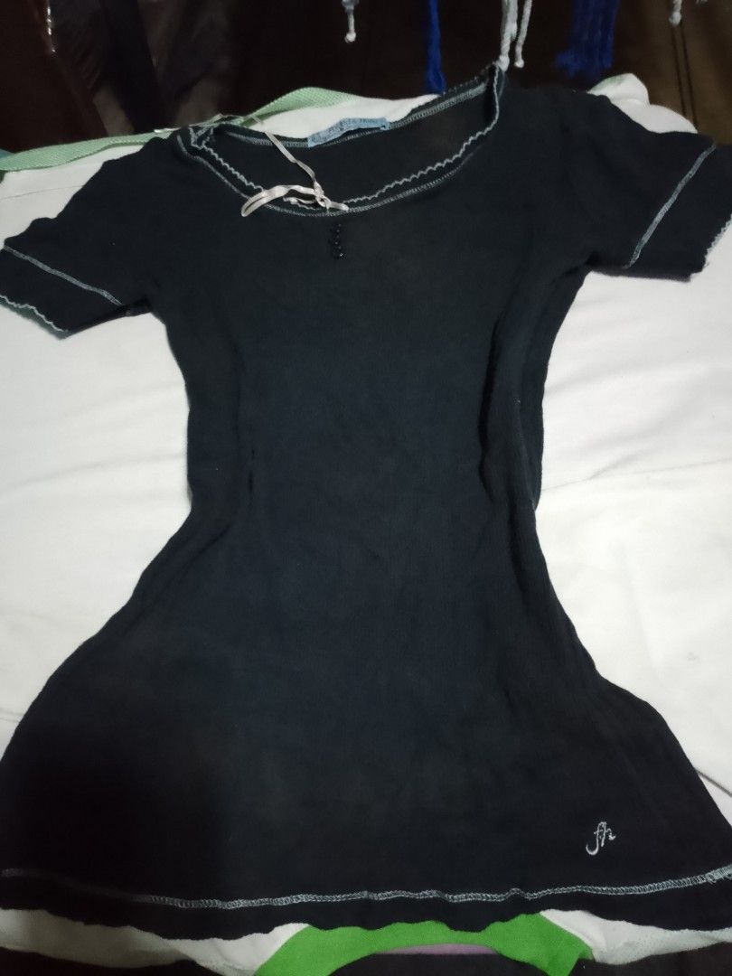 Folded & Hung Black Ribbed Short Sleeve Top (Category: Shirts) located in Batangas. Submitted by sheenx.09 (Listing ID 1465793535, Image 1). Description: - Brand: Folded & Hung - S on tag ( S to M) - Color: Black - Style: Fitted short sleeve ribbed top ♥️ - Neckline: Scoop neck with contrast stitching and mini decorative buttons 😁 - Accents: Cute front ribbon and embroidered logo initials near the bottom hem 😀 - Perfect for casual days, school,