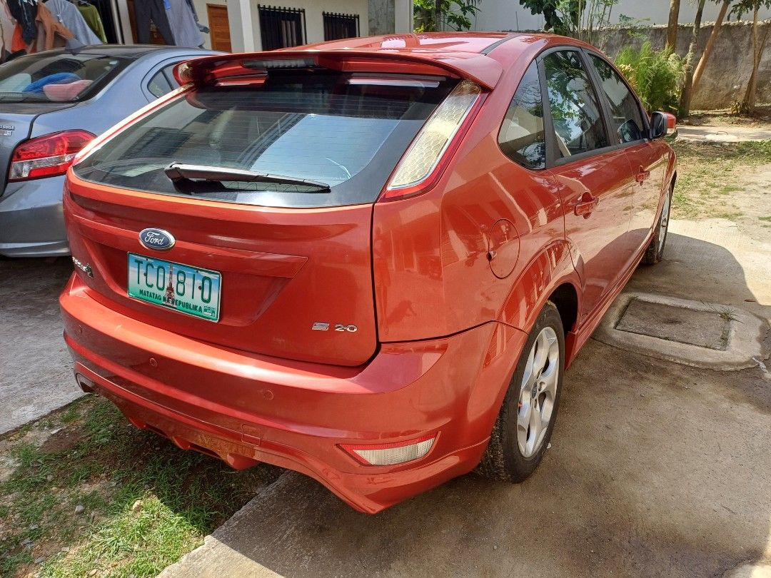 Ford Focus 2.0 Hatchback Auto (Category: Used Cars) located in Silang. Submitted by nrous.ph (Listing ID 1465822119, Image 2). Description: Just passed 80,000km on my very well taken care of Ford Focus Red sport. I own it since 42,000 km. I regularly maintain it. Non smoking. Good smell. Safety triangle, fire extinguisher, spare wheel and wheel changing tools provided. Registered/insured until October 2027. Honest issues: It has some scratches an