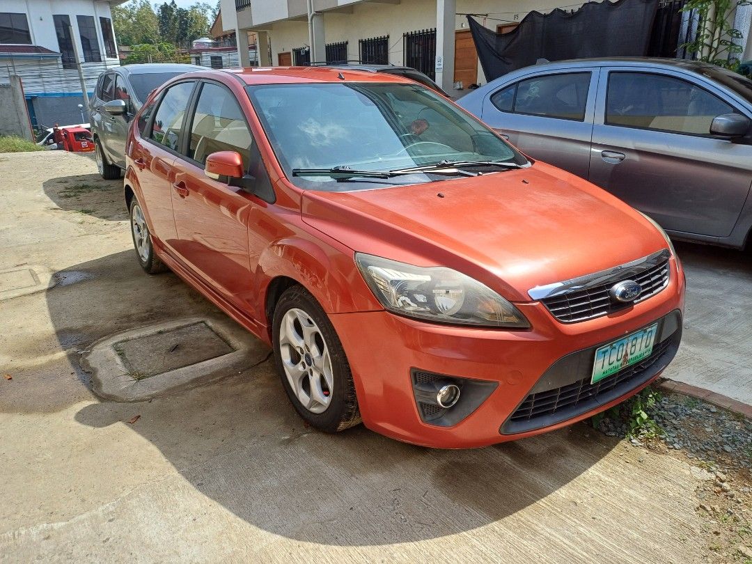 Ford Focus 2.0 Hatchback Auto (Category: Used Cars) located in Silang. Submitted by nrous.ph (Listing ID 1465822119, Image 1). Description: Just passed 80,000km on my very well taken care of Ford Focus Red sport. I own it since 42,000 km. I regularly maintain it. Non smoking. Good smell. Safety triangle, fire extinguisher, spare wheel and wheel changing tools provided. Registered/insured until October 2027. Honest issues: It has some scratches an