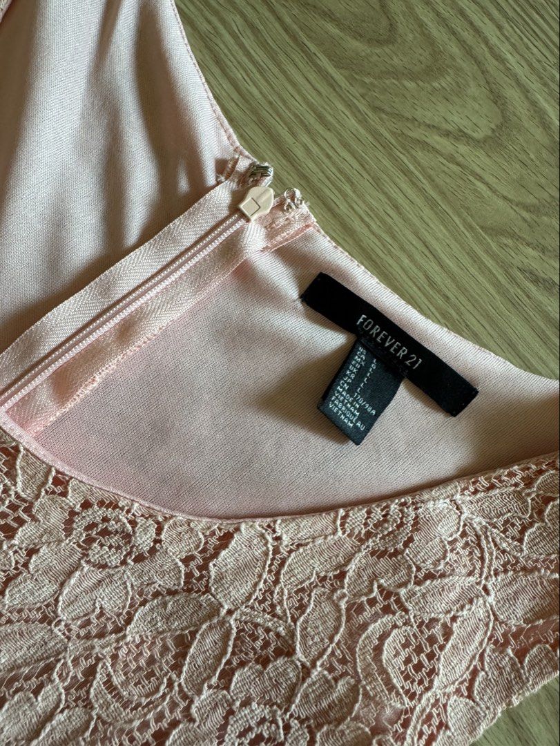 Forever 21 | Peach Lace Dress - Large (Category: Dresses) located in Roxas City. Submitted by elliesuite (Listing ID 1465770662, Image 3). Description: Read: LAST PRICE POSTED ‼️ NO WHEN WORN ‼️ NO MEASUREMENTS ‼️ Still in good condition Needs wash. Stored for quite some time but no flaws! Size: Large SF c/o Buyer. (JRS Express ONLY ₱150 - no other courier) No grab/lala (not from the Metro) All sales are final. No REFUND. No return / exchange. .