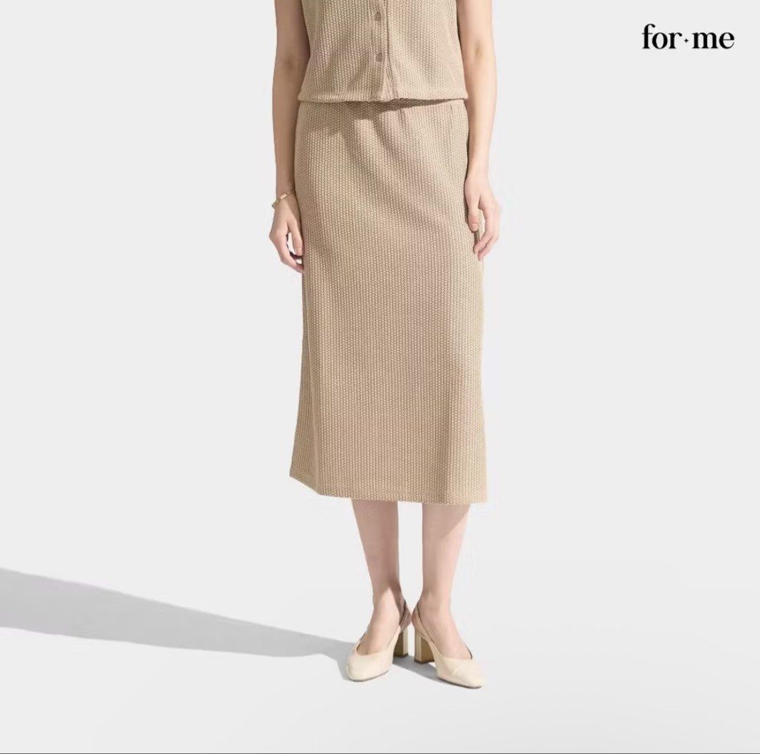 for.me Crochet Midi Skirt (Category: Skirts) located in Manila. Submitted by caramelbliss (Listing ID 1465927377, Image 2). Description: - Color: Beige - Material: Textured knit fabric - Fit: Relaxed elastic waistband - Design: Midi length with a side slit at the hem for easy movement - Styling: Pairs great with matching tops or casual tees - Note: Size chart included in photos, feel free to send a message for inquiries! Seller’s Notes: - FIXED P