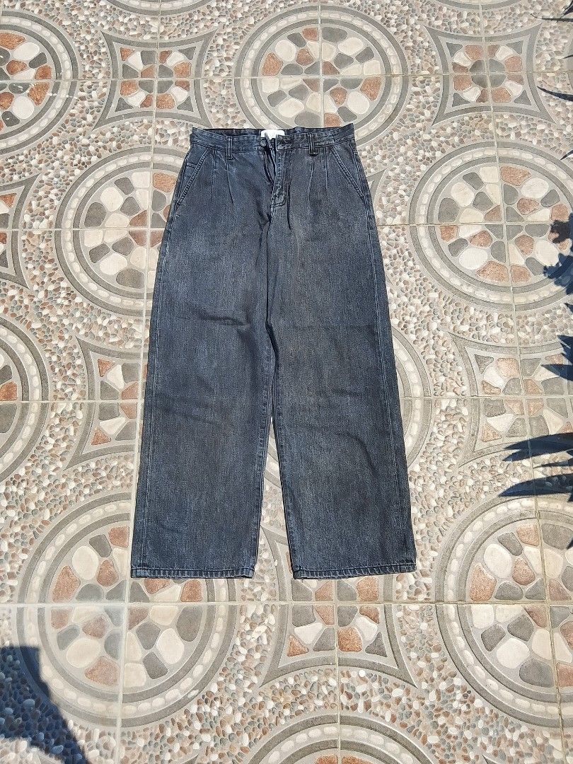Fottners Two Tuck Wide Black Jeans Size M (Category: Jeans) located in Cabuyao City. Submitted by kyokiiiiiii (Listing ID 1465777790, Image 1). Description: - Brand: Fottners - Item: Two Tuck Wide Black Jeans - Size: Medium - Color: Washed Black - Fit: Relaxed, wide-leg with stylish front pleats - Condition/Details: Great streetwear staple, check tags for exact fabric - Price: Below retail (~159,000 KRW) -payment first -Shipping fee is shouldered