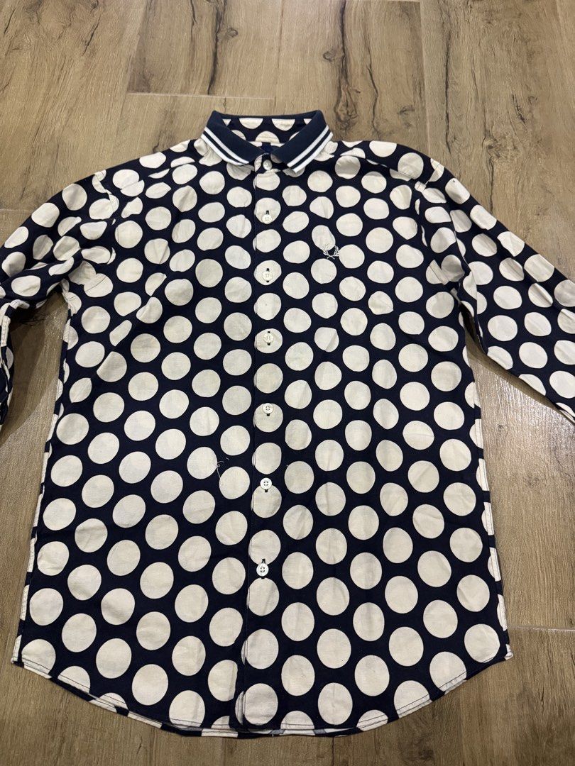 Fred Perry Botton Blouse (Category: Blouses) located in Tagaytay City. Submitted by prelovedbytmj (Listing ID 1465885663, Image 1). Description: Fred PerryButyon Blouse. Color Polka Dits Blue. Size Small to Medium.