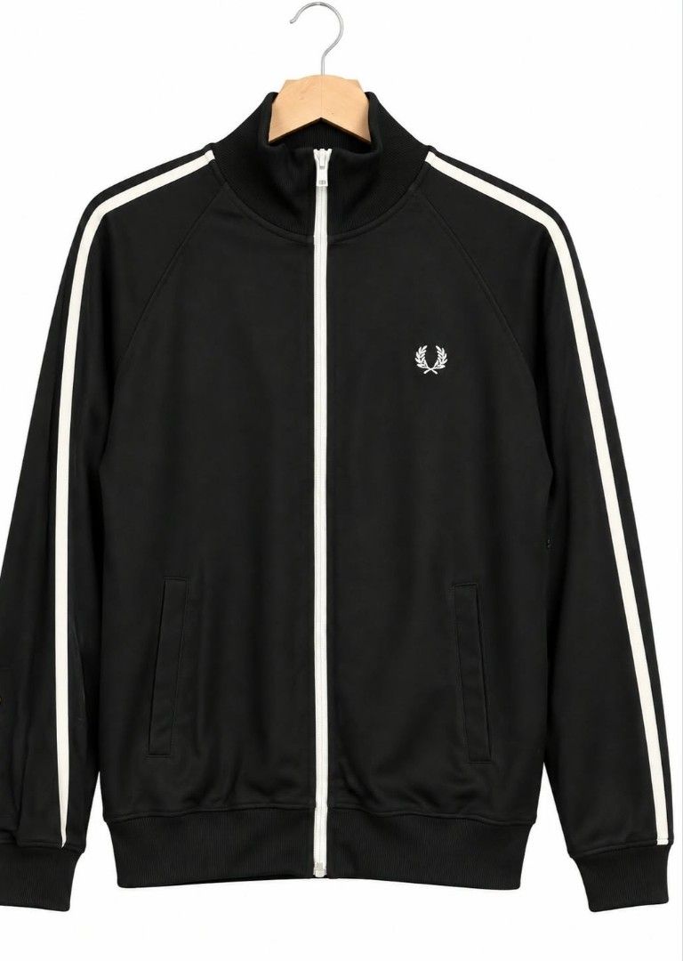 Fred Perry track jacket (Category: Coats, Jackets and Outerwear) located in Baguio. Submitted by li_aaan (Listing ID 1465852292, Image 1). Description: Items are authentic and in excellent condition.