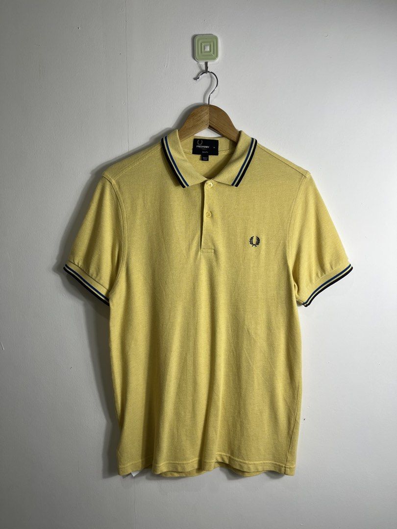 Fred Perry Twin tipped Poloshirt Medium (Category: Tshirts & Polo Shirts ) located in Nasugbu. Submitted by janstuffs.ph (Listing ID 1465821697, Image 1). Description: Fred Perry Light Yellow Twintipped Poloshirt Authentic💯 Size on tag: MEDIUM Dimension: 19"W x 27"L Best fit: MEDIUM Condition: 10/10 Like New Flaw: None Mine: 1580 Thankyou po 🫶💕.