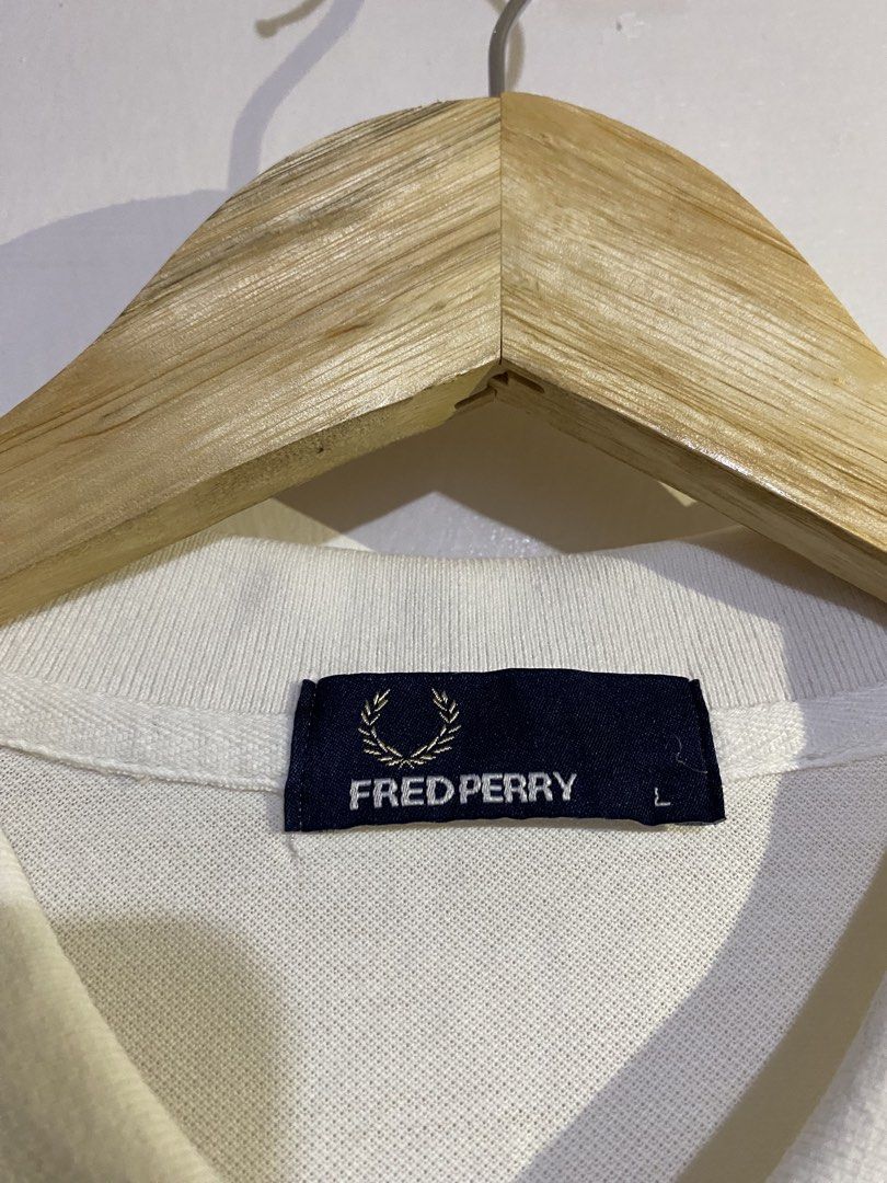 FREDPERRY POLO SHIRT (Category: Tshirts & Polo Shirts ) located in Cebu City. Submitted by arsenyong (Listing ID 1465918554, Image 2). Description: 21 width 30 length Very good condition Issue:last pic pinhole 9/10 color ate Need wash only .