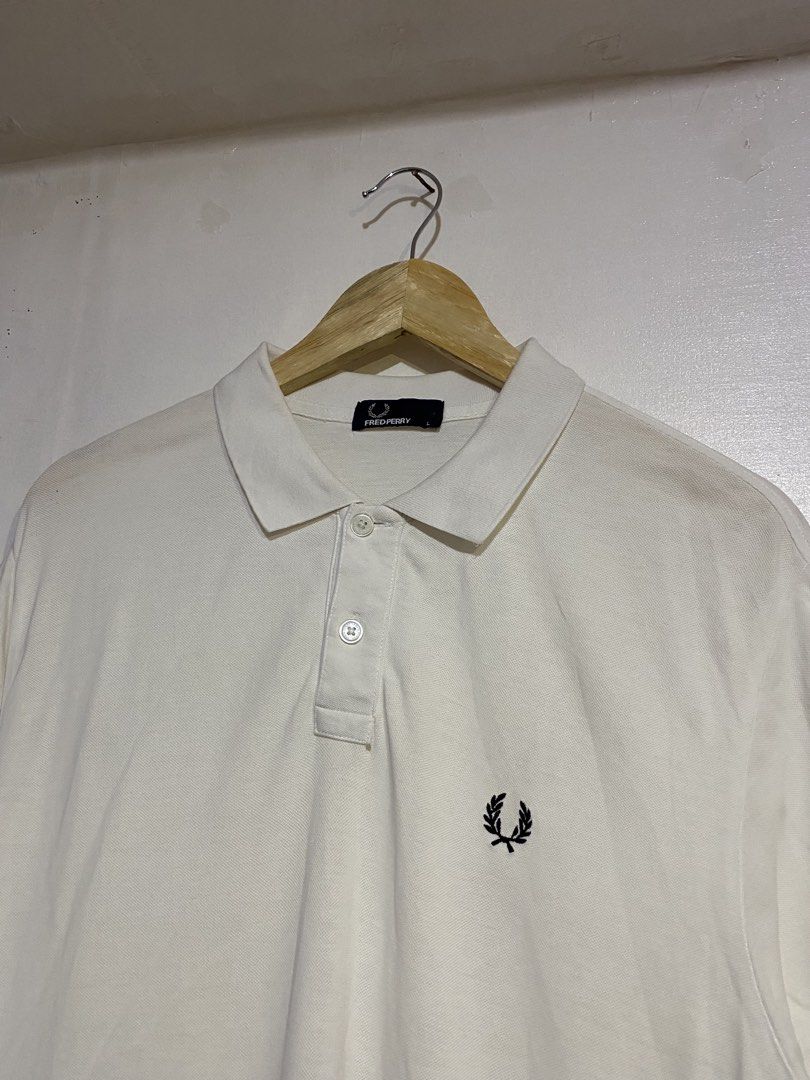 FREDPERRY POLO SHIRT (Category: Tshirts & Polo Shirts ) located in Cebu City. Submitted by arsenyong (Listing ID 1465918554, Image 3). Description: 21 width 30 length Very good condition Issue:last pic pinhole 9/10 color ate Need wash only .