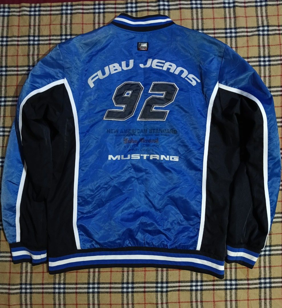 Fubu The Collection Ford Racing Bomber Jacket Size L (Category: Coats, Jackets and Outerwear) located in General Santos City (Dadiangas). Submitted by freehorse.5f2a61 (Listing ID 1465918798, Image 2). Description: - Brand: Fubu The Collection - Style: Racing jacket with blue and black colorway - Size: L (Tag included) - Design details: Ford and SVT chest branding, NASCAR Nextel Cup right sleeve print, and big number 92 with Fubu Jeans Mustang ba