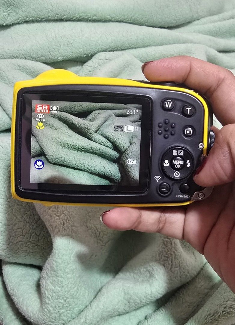 Fujifilm FinePix XP80 Waterproof Digital Camera Yellow (Category: Cameras) located in Manila. Submitted by calonzoiss12752 (Listing ID 1465880484, Image 3). Description: - Model: Fujifilm FinePix XP80 (Bright Yellow) - Condition: Fully functional, clear screen, excellent working order - Durability: Waterproof up to 15 meters and shockproof - Features: Built-in Wi-Fi for quick and easy photo transfers - Inclusions: Original box, power adapter, and