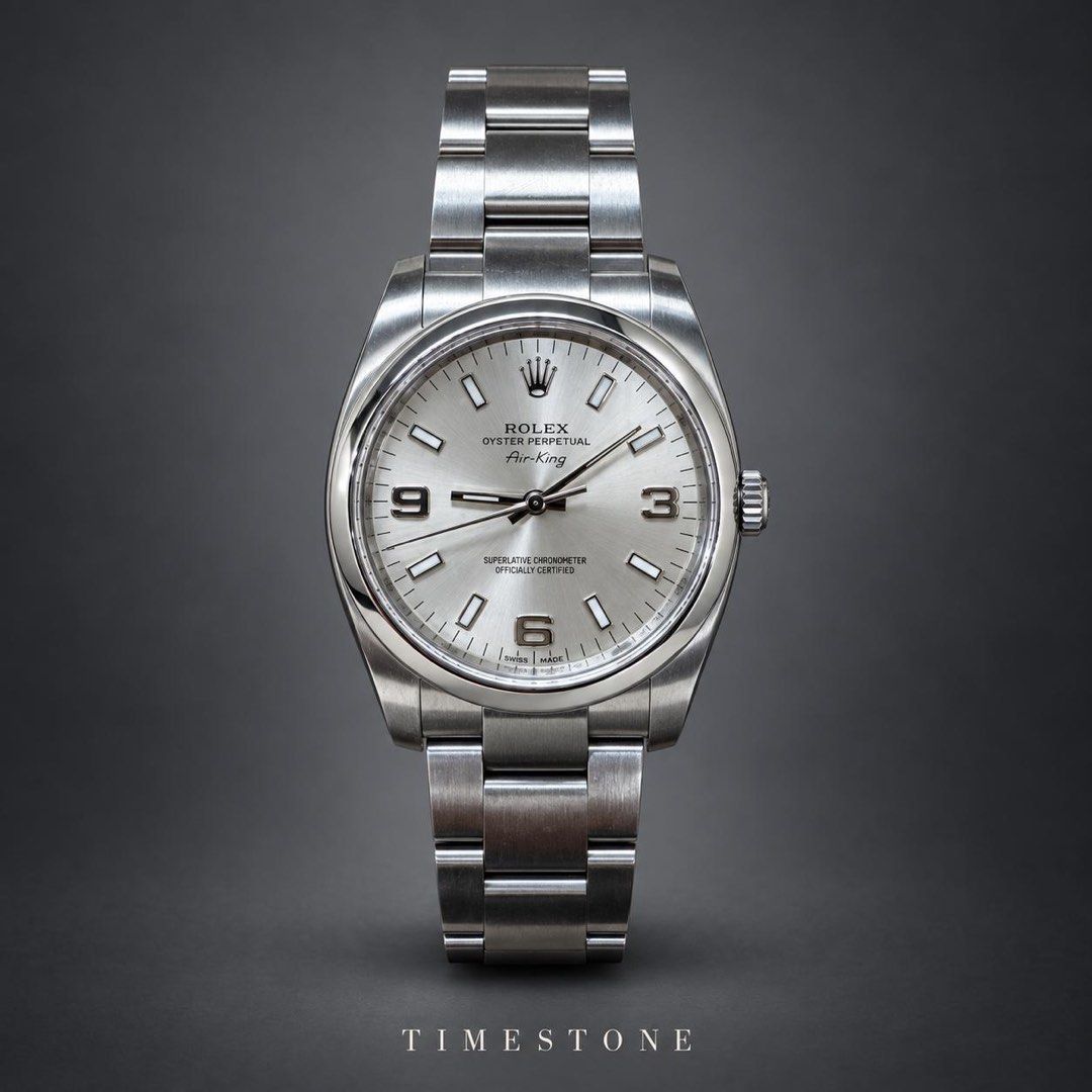 Full Set 34mm Rolex Air-King · Silver Dial 2014 (Category: Watches) located in Singapore. Submitted by watchdistrict (Listing ID 1465813193, Image 1). Description: TIMESTONE | NEW ARRIVAL Rolex Air-King · Silver Dial A silver sunburst dial, distinctive 3–6–9 numerals and a smooth steel bezel. Understated elegance on an Oyster bracelet, ready for everyday wear. Price: SGD $6,580 Reference: 114200 Dial: Silver Dated: 22 September 2014 Condition: Us