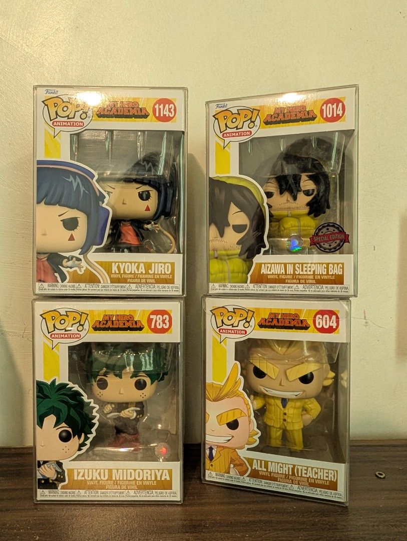 Funko Pop My Hero Academia Vinyl Figures Bundle (Category: Figurines & Statues) located in Marilao. Submitted by fnjin (Listing ID 1465815418, Image 1). Description: - Bundle of 4 My Hero Academia Funko Pop figures - Includes: Kyoka Jiro 1143, Aizawa in Sleeping Bag 1014 (Special Edition sticker), Izuku Midoriya 783, and All Might Teacher 604 - All figures securely stored inside protective plastic cases - Clean boxes, minimal creases, and clear w