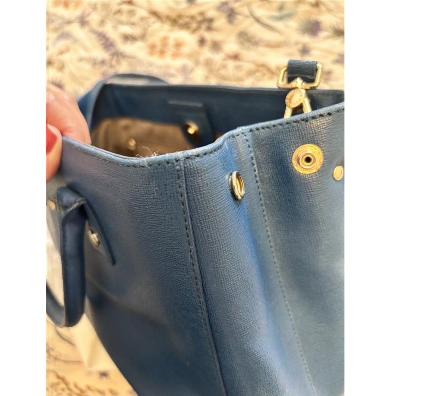 Furla Linda Tote Bag Navy (Category: Tote Bags) located in Manila. Submitted by Giacumu (Listing ID 1465863196, Image 3). Description: - Brand: Furla Linda Tote - Color: Dark Navy Blue - Material: Durable Saffiano leather with gold-tone hardware - Features: Signature round F charm, zip top closure, and structured sides - Interior: Fabric lining with 1 zippered pocket and slip pockets - Inclusion: Original white dust bag - Condition/Use: Great eve