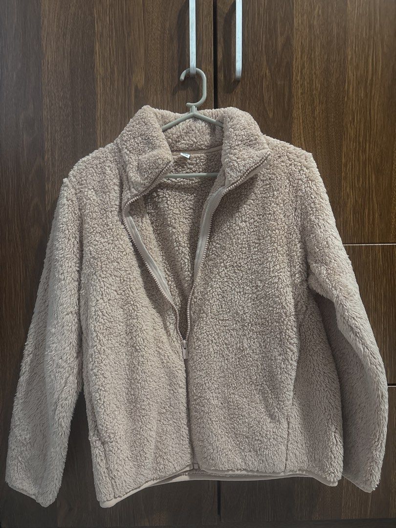 Fuzzy beige zip-up fleece jacket (Category: Coats, Jackets and Outerwear) located in Paranaque City. Submitted by rosexxxd (Listing ID 1465903220, Image 1). Description: - Color: Peach - Material: Soft textured fuzzy fleece - Used only about two times then stored - RFS: too small for me - DM to negotiate.