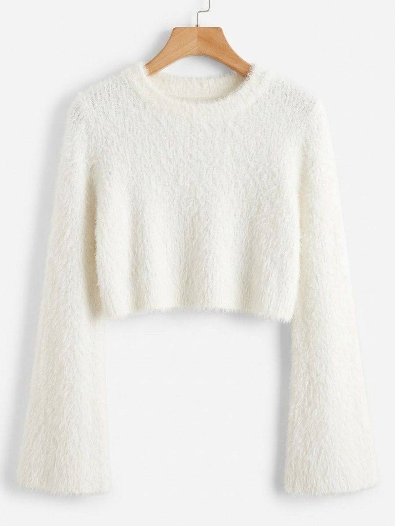 Fuzzy cropped knit sweaters. (Category: Longsleeves) located in Manila. Submitted by sengfigther06francis (Listing ID 1465940435, Image 1). Description: White cropped sweater from the GRL Collection stands out with its soft, fuzzy shaggy knit texture and dramatic flared sleeves. Small to Medium Size.