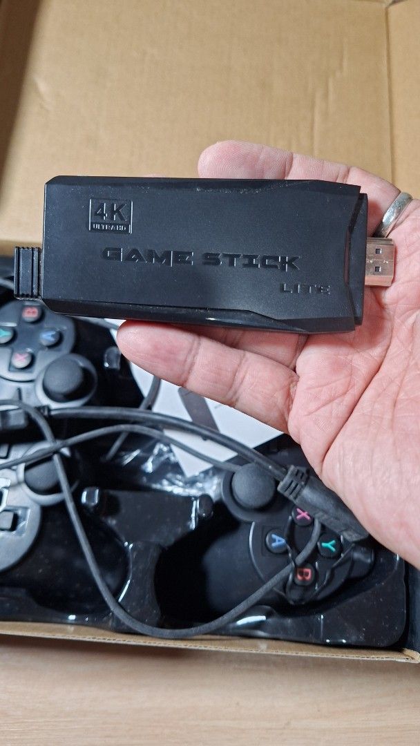 Game Stick Lite 4K Wireless Controller Gamepad (Category: Controllers) located in Baguio. Submitted by restyrille77846 (Listing ID 1465889157, Image 3). Description: - Plug-and-play retro gaming console that connects directly to your TV via HDMI - Includes 2 wireless gamepads with dual analog sticks for comfortable multiplayer action - Ready to play out of the box with included USB receiver, HDMI extension cable, and manual - Packed in a nice ori