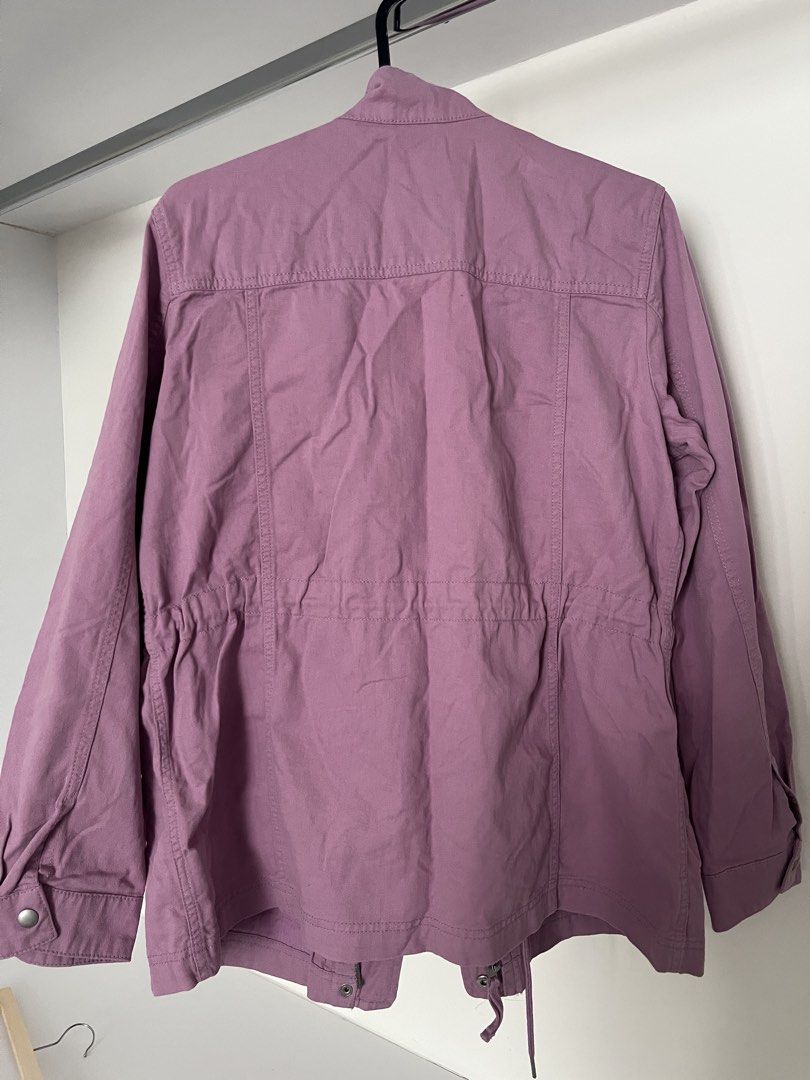 Gap Purple Utility Jacket (Category: Coats, Jackets and Outerwear) located in Quezon City. Submitted by cooperminie (Listing ID 1465816092, Image 2). Description: - Brand: Gap - Style: Utility Jacket - Color: Dusty Purple - Size: L - Material: Solid cotton twill - Closure: Full zip front with snaps - Pockets: Functional chest and side pockets - Fit: Adjustable drawstring waist.