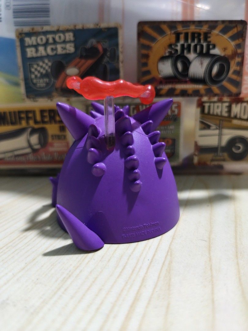 Gigantamax Gengar Pokémon Figure T-ARTS (Category: Figurines & Statues) located in Valenzuela. Submitted by chuwie1026 (Listing ID 1465882599, Image 2). Description: - Authentic Nintendo Pokémon merchandise by T-ARTS (stamped on base) - Features Gigantamax Gengar with tongue sticking out - Includes red cloud detail floating above the head on a clear stand - Stands upright on its own - Standard gashapon figure size - Ideal for Pokémon fans and toy