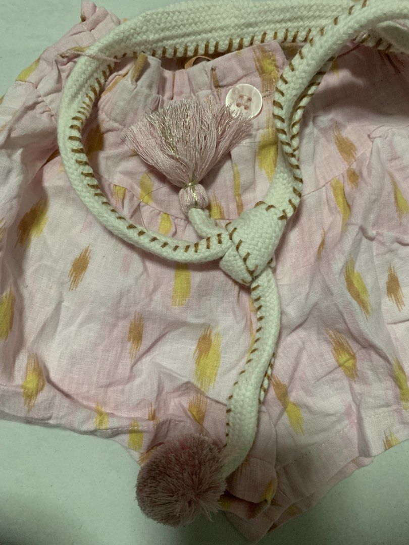 Gingersnaps Pink Printed Shorts with Belt Size 2 (Category: Babies & Kids Fashion) located in Malabon City. Submitted by vewonica (Listing ID 1465811665, Image 2). Description: - Brand: Gingersnaps - Size: 2 (Toddler) - Design: Pink shorts with yellow brushstroke prints - Waistband: Elasticated back with single front button closure - Extra: Includes a thick knitted belt with playful pink tassels and pom-poms - Comfort: Made from soft, toddler-fri