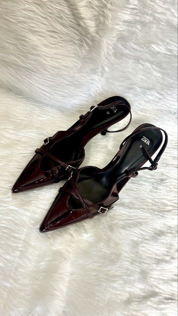 Glossy Burgundy Patent Heels (Category: Heels) located in Manila. Submitted by vintage_og_bagash (Listing ID 1465815065, Image 2). Description: Glossy Burgundy Patent Heels • Condition: Good as new • Heel Height: 2.5 inches • Details: Pointed toe, criss-cross buckle straps, and a sleek slingback design • Material/Finish: High-gloss patent finish (smooth, mirror-like, and water-resistant coating) • Size: [Insert size] • Color: Deep burgundy / oxbl