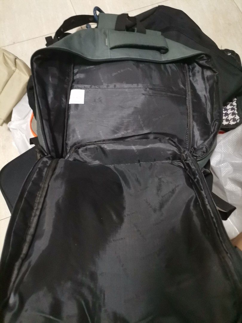 GNB Olive Green Travel Backpack (Category: Backpacks) located in Makati City. Submitted by kookybearsstuff (Listing ID 1465822574, Image 2). Description: - Brand: GNB - Color: Olive green - Versatile daily bag for school, work, or travel - Large main compartment for easy packing - Front section with zip mesh pocket and buckle strap - Padded black mesh back panel and shoulder straps for breathability - Convenient top handle and side grab handle.