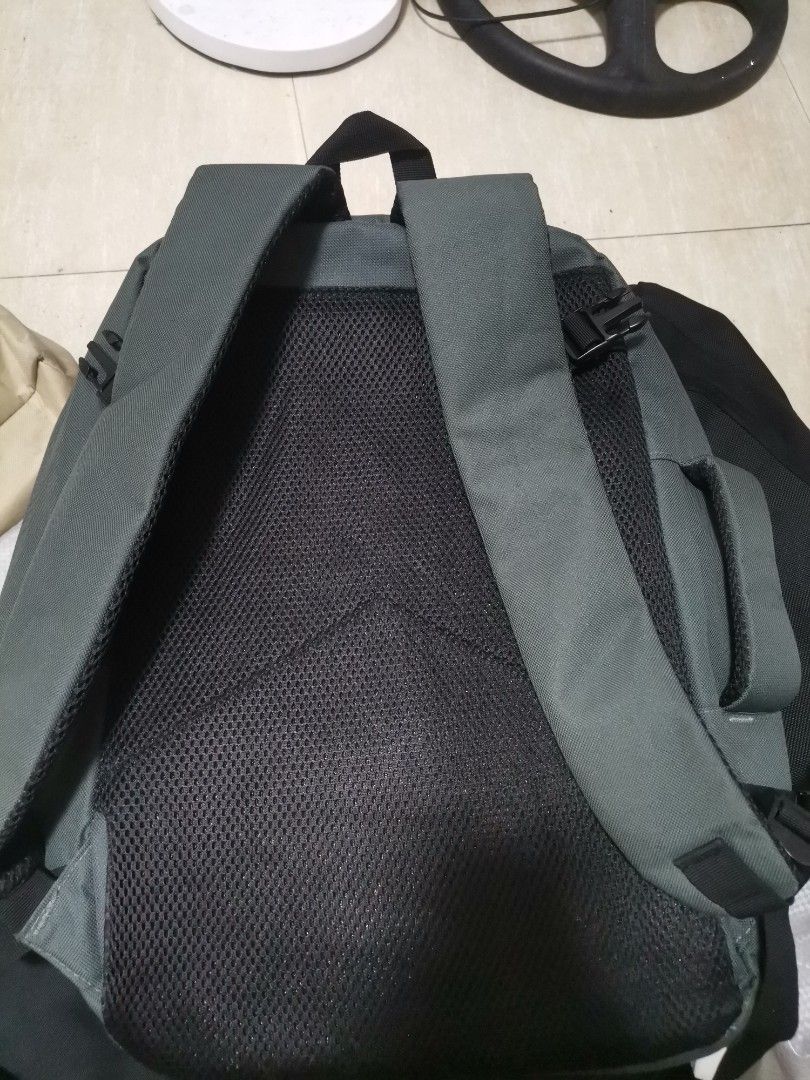 GNB Olive Green Travel Backpack (Category: Backpacks) located in Makati City. Submitted by kookybearsstuff (Listing ID 1465822574, Image 3). Description: - Brand: GNB - Color: Olive green - Versatile daily bag for school, work, or travel - Large main compartment for easy packing - Front section with zip mesh pocket and buckle strap - Padded black mesh back panel and shoulder straps for breathability - Convenient top handle and side grab handle.