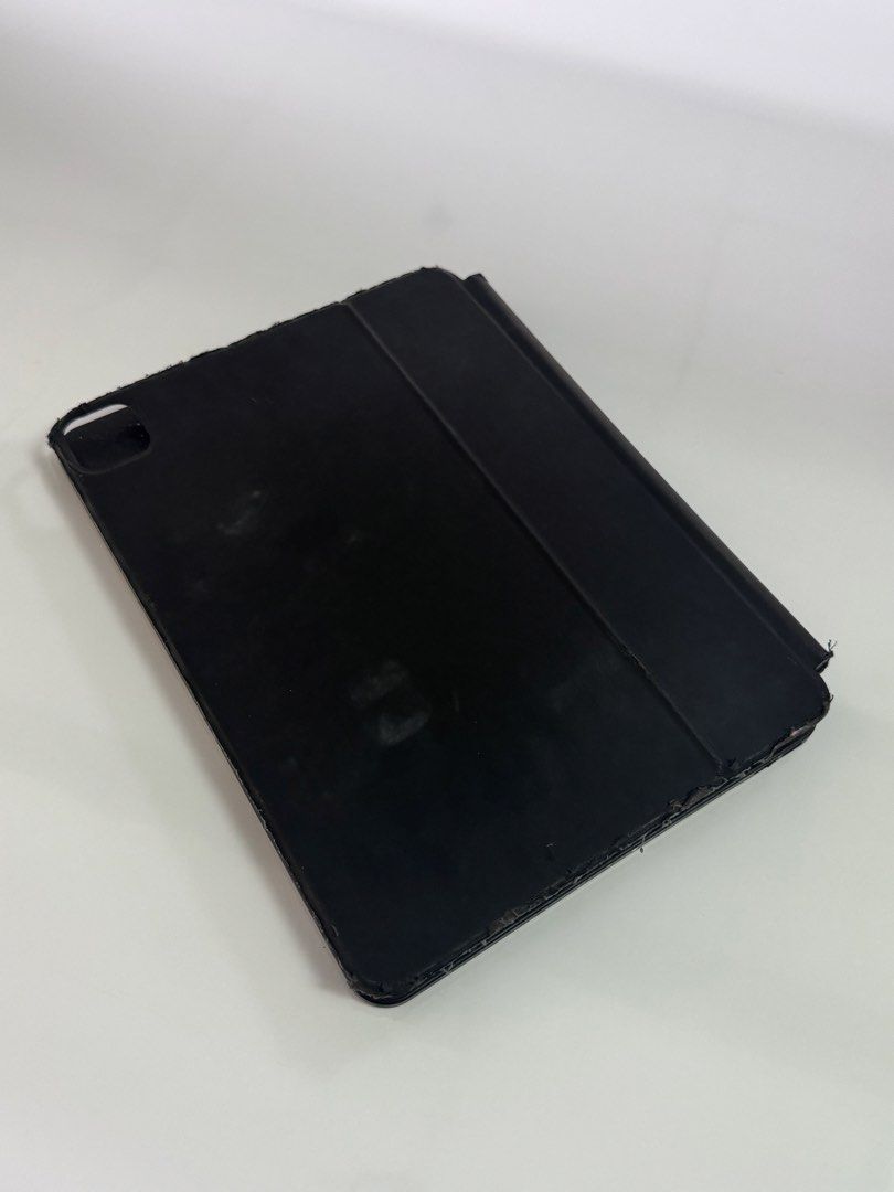 Goojodoq keyboard 3rd gen (Category: Cases & Sleeves) located in Manila. Submitted by annadraftt (Listing ID 1465852745, Image 2). Description: - Brand/Model: Goojodoq Keyboard 3rd Gen - Color: Classic Black - Features: Integrated trackpad, folio case design, smooth typing keys - Condition: Pre-owned with visible minor wear on the exterior .