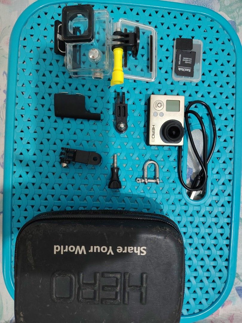 GoPro Hero 3 Action Camera Bundle with Case and Accessories (Category: Video Cameras) located in Paranaque City. Submitted by lucille1280 (Listing ID 1465794539, Image 1). Description: - GoPro Hero 3 action camera, tested and working - Waterproof housing case included - SanDisk microSD memory card with adapter - USB charging cable - Extra mounts and thumbscrews - Hard zippered carrying case with custom foam cutout - Ideal for outdoor sports, trav