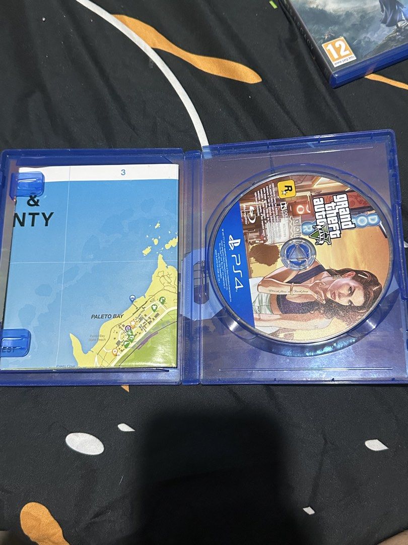 Grand Theft Auto V Premium Edition PS4 (Category: PlayStation) located in Manila. Submitted by _ladiezman217 (Listing ID 1465920629, Image 2). Description: - Title: Grand Theft Auto V Premium Edition for PS4 - Inclusions: Original case, clean game disc, and world map insert - Condition: Excellent, tested, and ready to play - Genre: Action & open-world exploration .