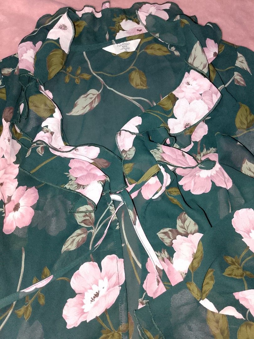 Grassy Meadow Tie-Neck Ruffle Blouse (Category: Longsleeves) located in Himamaylan. Submitted by _lalaoise (Listing ID 1465852893, Image 2). Description: Negotiable! I think the fabric is chiffon (lightweight and a little rasp) This is reallyyy pretty, flowy and ruffles on neck and hands, neck-tie. Shipping thru J &T..