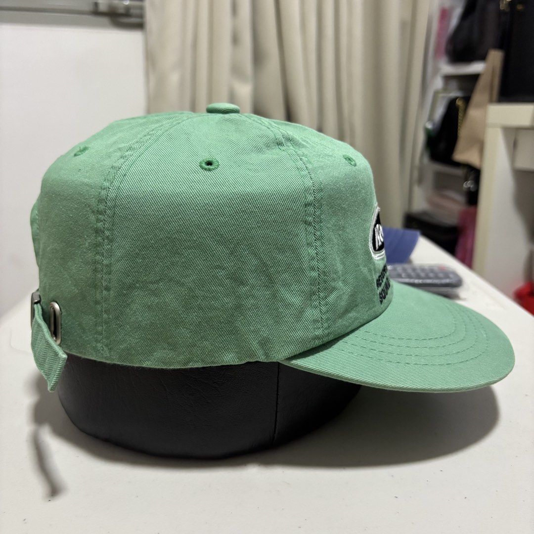 Green Camp Hat (Category: Caps & Hats) located in Quezon City. Submitted by grailph (Listing ID 1465882417, Image 3). Description: - Brand/Collab: The Moment x Unisex Market - Design: Green 6-panel cap with "Record" embroidered front patch - Size: M (with adjustable strap and silver metal clasp) - Details: Embroidered eyelets for breathability - Condition: Excellent/Ready to wear Color rate 7/10 Even fade.