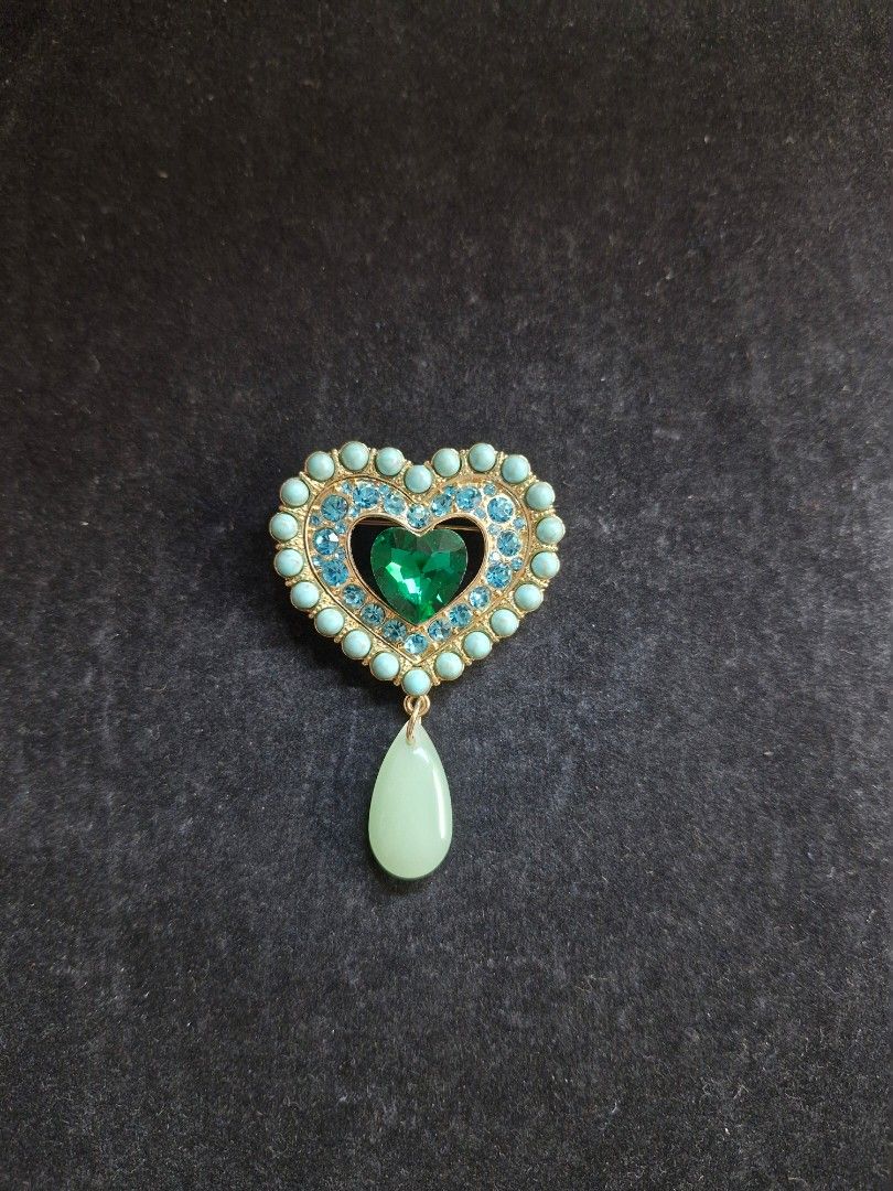 Green Heart Tassel Brooch (Category: Brooches) located in Taguig. Submitted by mommaschoice (Listing ID 1465767443, Image 1). Description: Brand New Adorned w/green rhinestones Lightweight won't be the fabric Ships nationwide.
