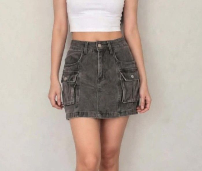 Grey Denim Cargo Mini Skorts Size 28 (Category: Skirts) located in Bacoor. Submitted by leah.92 (Listing ID 1459702837, Image 1). Description: - Cool grey denim mini skirt - Two large front cargo pockets with button closures - Classic five-pocket styling - Versatile: pairs well with t-shirts or crop tops - Perfect for casual outings.