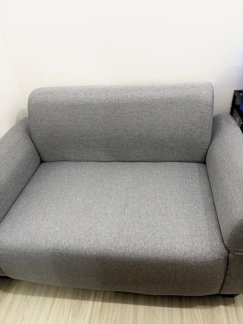 Gray Fabric 2-Seater Sofa (Category: Sofas) located in Muntinlupa City. Submitted by closetfinds_ph_952 (Listing ID 1465919745, Image 2). Description: 5 months used Fabric cloth No stain, no damages, no dents 2-seater sofa Rfs: lipat bahay Location: Alabang .