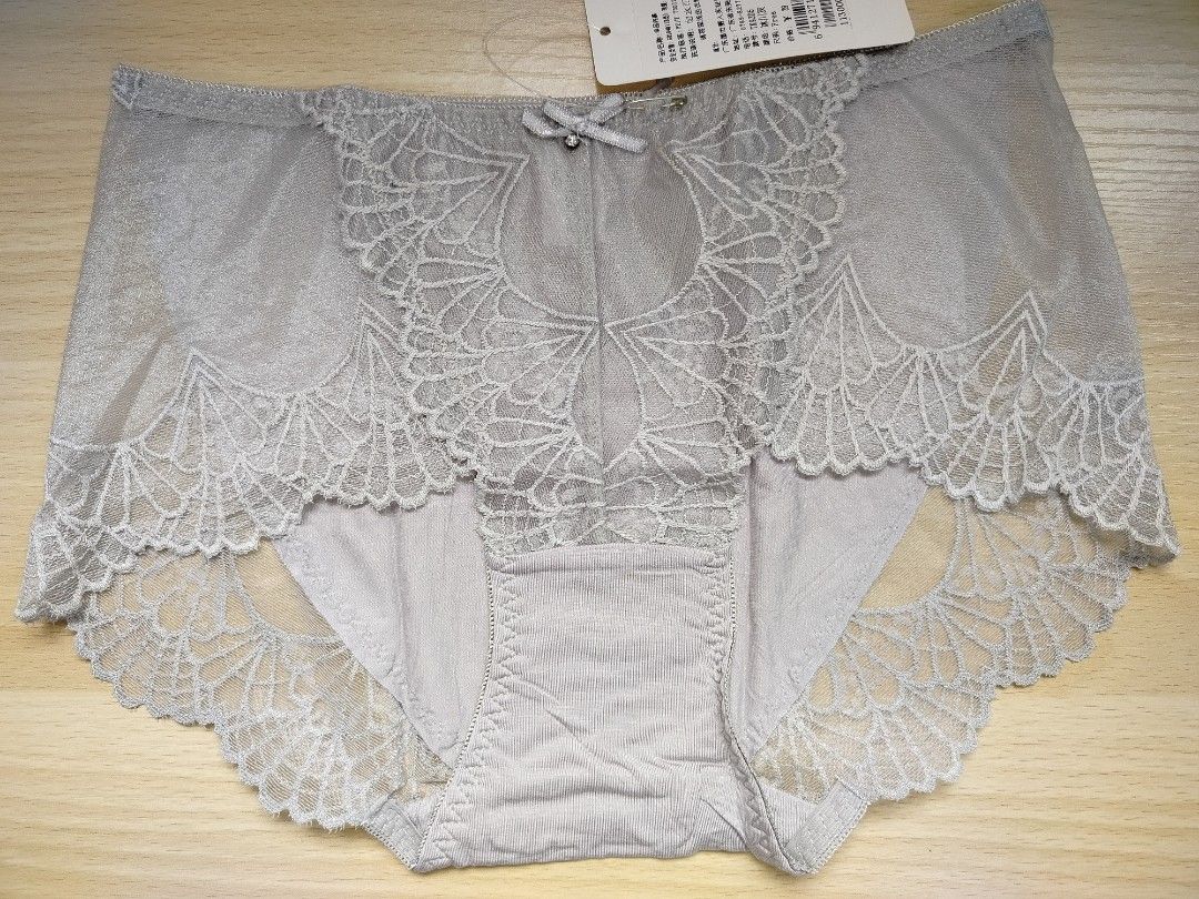 Grey Lace Sheer Briefs Intimates Underwear Medium (Category: Undergarments & Loungewear) located in Rizal. Submitted by etcthings (Listing ID 1465886142, Image 2). Description: - Brand: Brand new with original store tag attached - Size: Free size - Design: Sheer grey fabric with intricate floral lace trim - Details: Adorable satin bow charm at the center front waistband - Comfort: Soft and breathable fabric panel at the crotch.