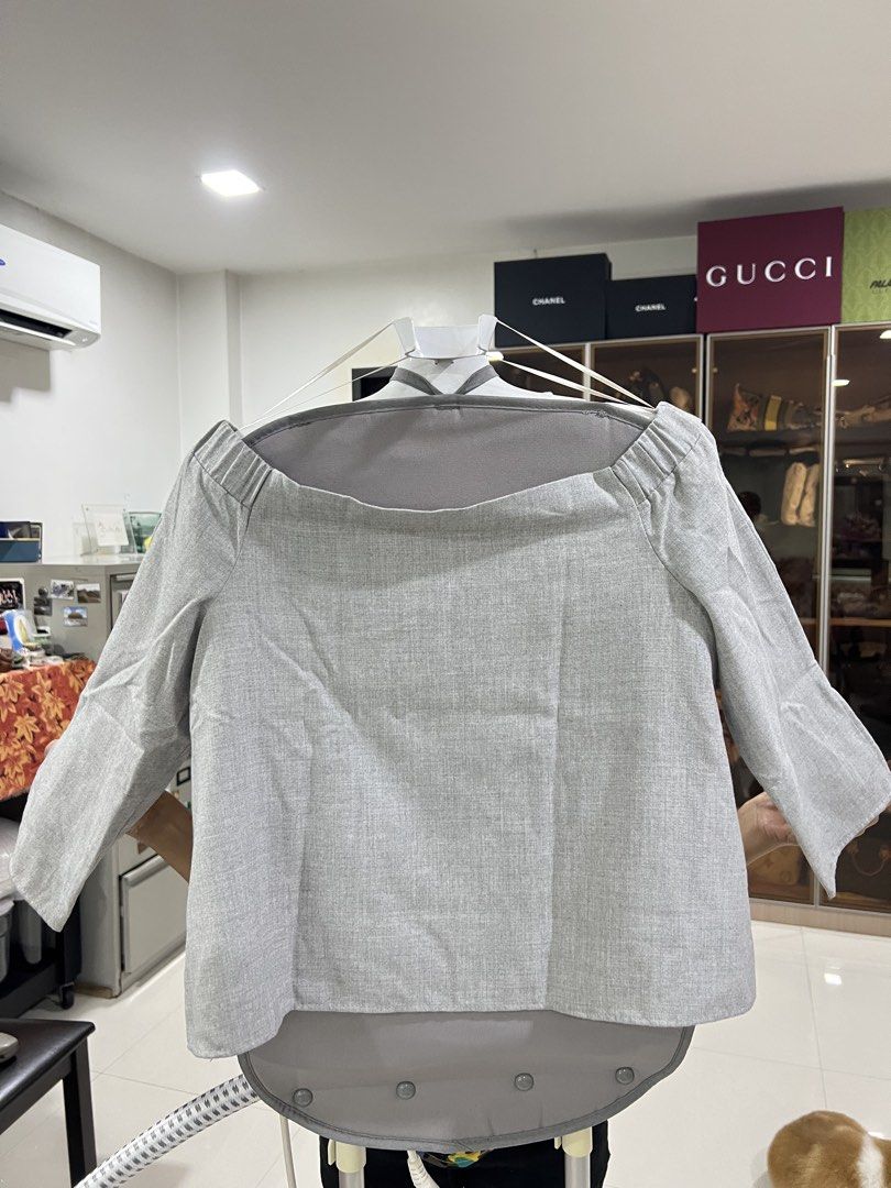 Grey Off-Shoulder 3/4 Sleeve Top (Category: Longsleeves) located in Manila. Submitted by imprincessg888 (Listing ID 1465846438, Image 1). Description: - Style: Off-shoulder top with a relaxed, boxy fit - Sleeves: 3/4 length - Material: Textured fabric in a versatile neutral grey - Neckline: Gathered elastic that holds its shape well - Perfect for casual days or easy styling.